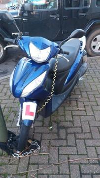 Honda vision scooter. 110cc. Metallic blue. Very reliable