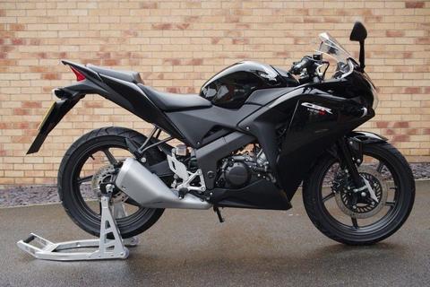 2015 Honda CBR125R in black, showroom condition with only 850 miles from 2 owners