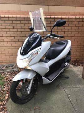 Honda Moped with Knowledge Board and cover
