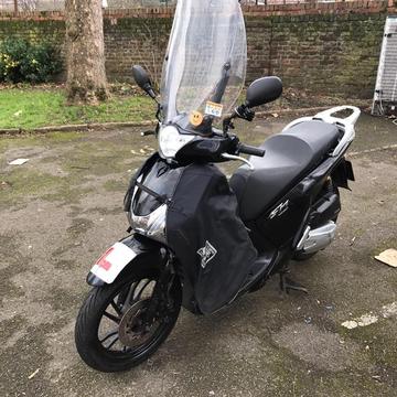 Honda sh 125 with all winter accessories