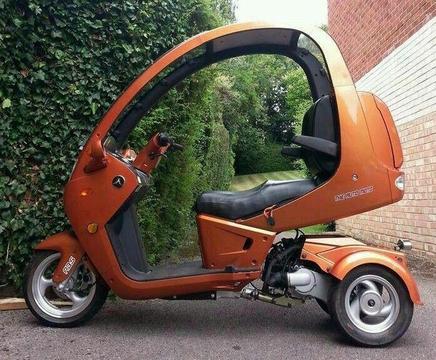 Three wheeled scooter trike with roof