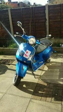 2015 vespa gts super 125 scooter only 65 miles on clock. AS NEW